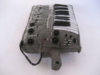 Illustration for article titled Miniature Synthesizer Replicas Cast in Felt Will Rock Your Tiny Mind